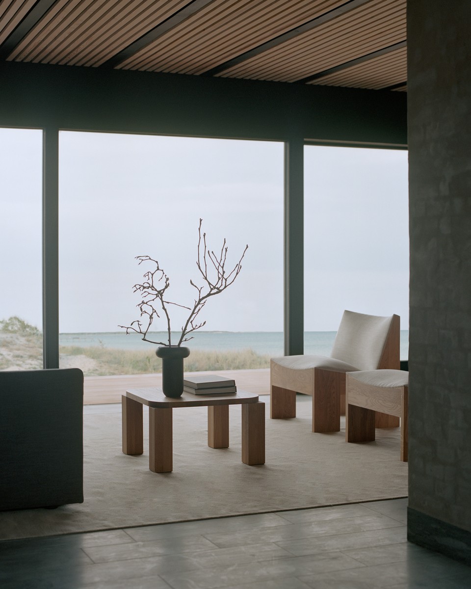 New-Works_Lifestyle_42631_Atlas-Coffee-Table_82x82_Fumed-Oak_43011_Tenon-Lounge-Chair_Fumed-Oak_Zinc-Drake-Spacedust_1