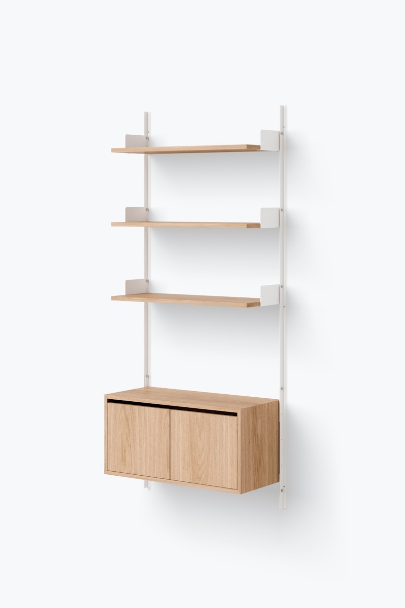1698665953-new_works_packshots_shelving_system_v1_configured_cabinet_low_w_doors_single_white_oak