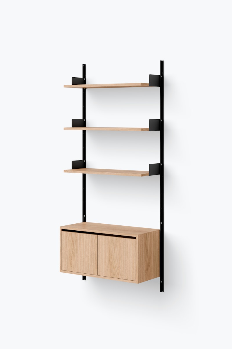 1698666932-new_works_packshots_shelving_system_v1_configured_cabinet_low_w_doors_single_black_oak