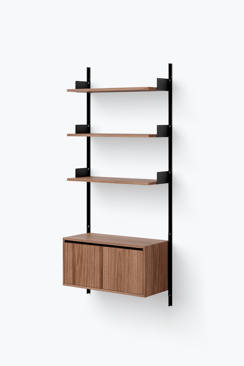 1698668735-new_works_packshots_shelving_system_v1_configured_cabinet_low_w_doors_single_black_walnut