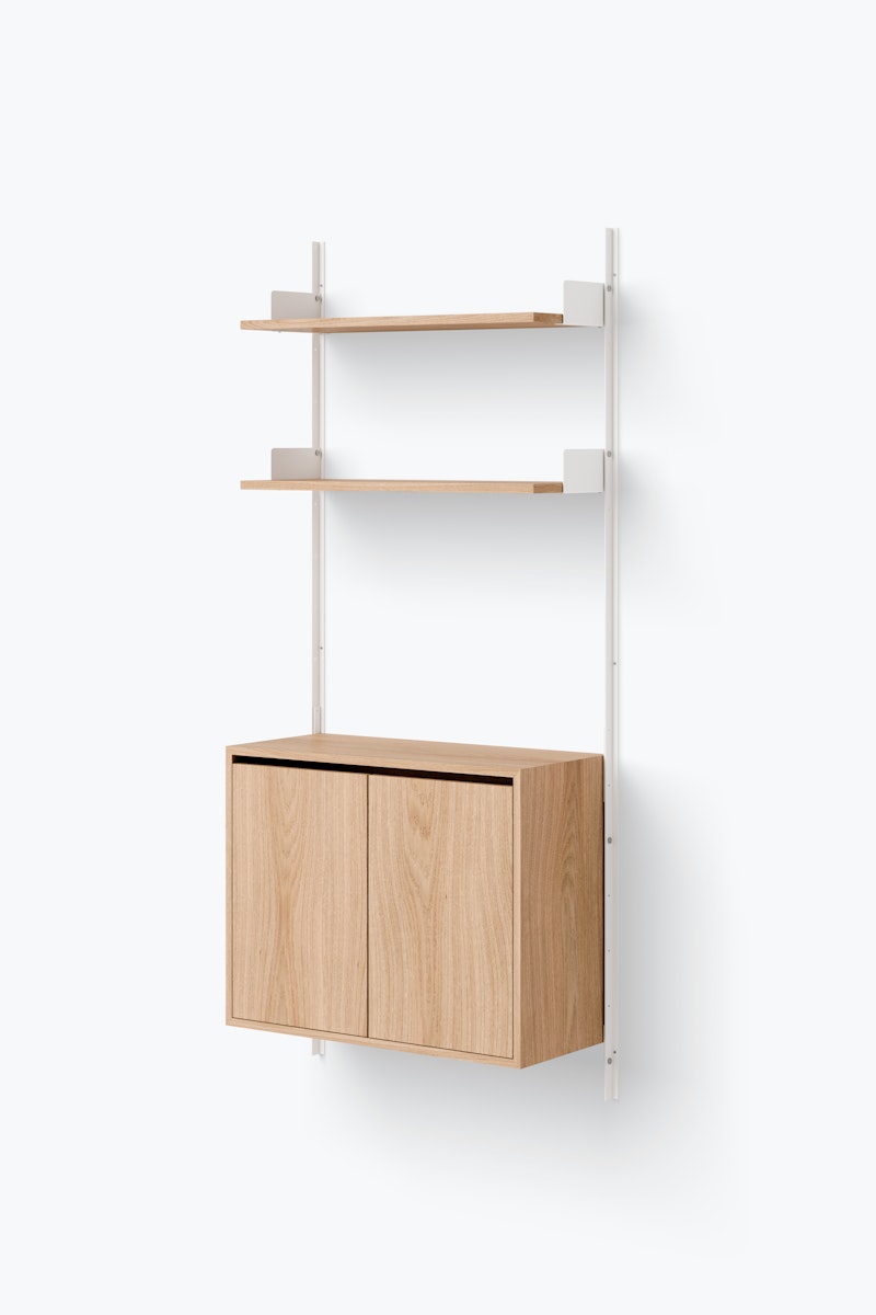 1698669265-new_works_packshots_shelving_system_v1_configured_cabinet_tall_w_doors_single_white_oak