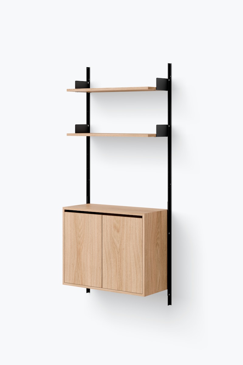 1698669618-new_works_packshots_shelving_system_v1_configured_cabinet_tall_w_doors_single_black_oak